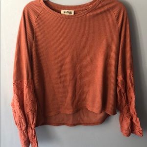 Orange long sleeve shirt